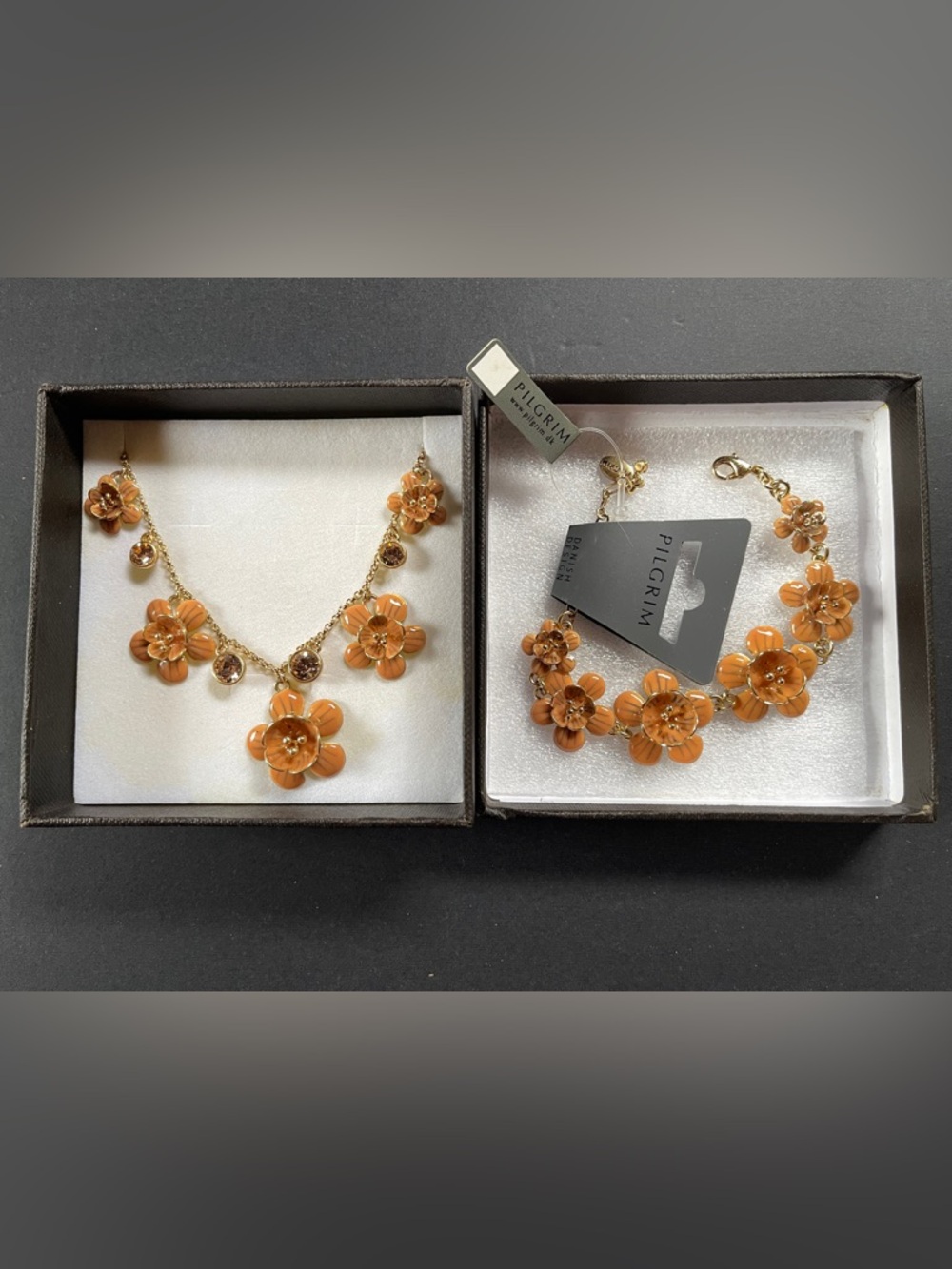Pilgrim Gold-Tone Necklace and Bracelet Set with Orange Flower Charms